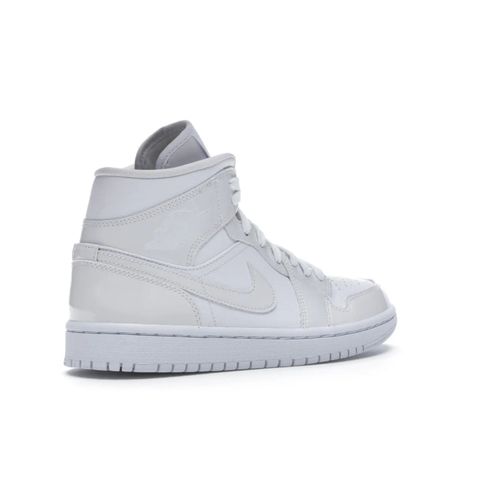 Jordan 1 Mid Triple White Patent Swoosh (Women's)